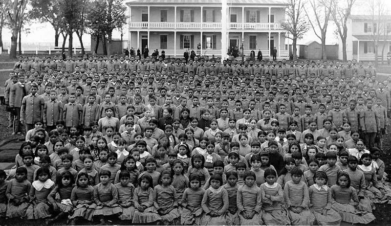 Student body assembled on the Carlisle Indian School Grounds. Read more: http://bit.ly/1KTUIuS